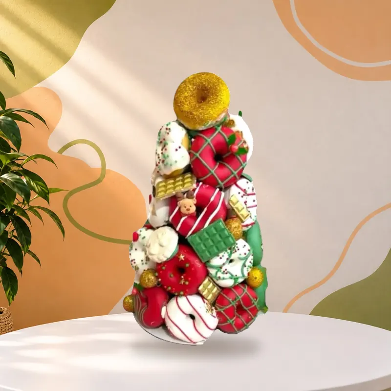 Torre navideña de galletas y postres decorados